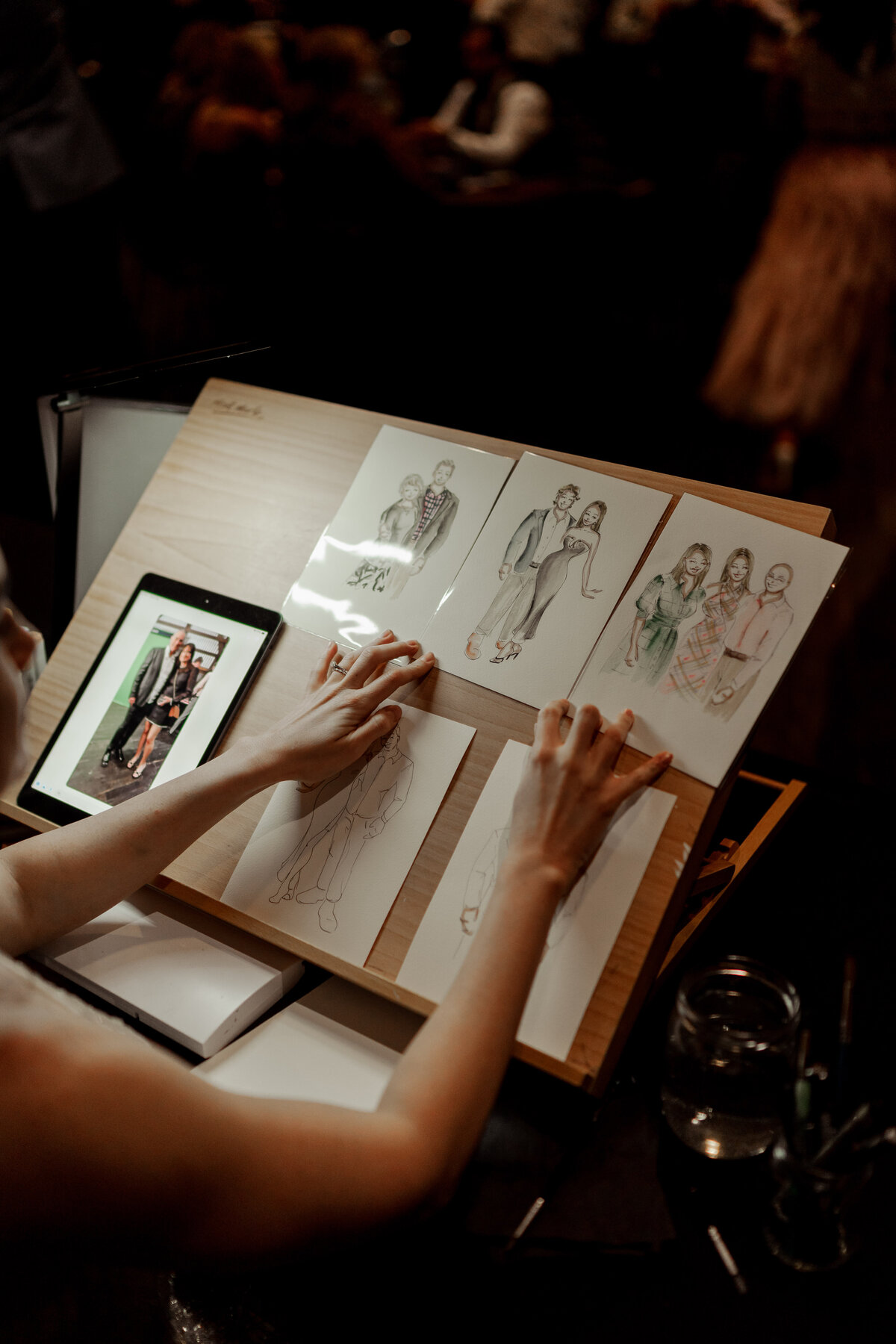 live-guest-illustrator-creating-portraits-at-50th-birthday-party