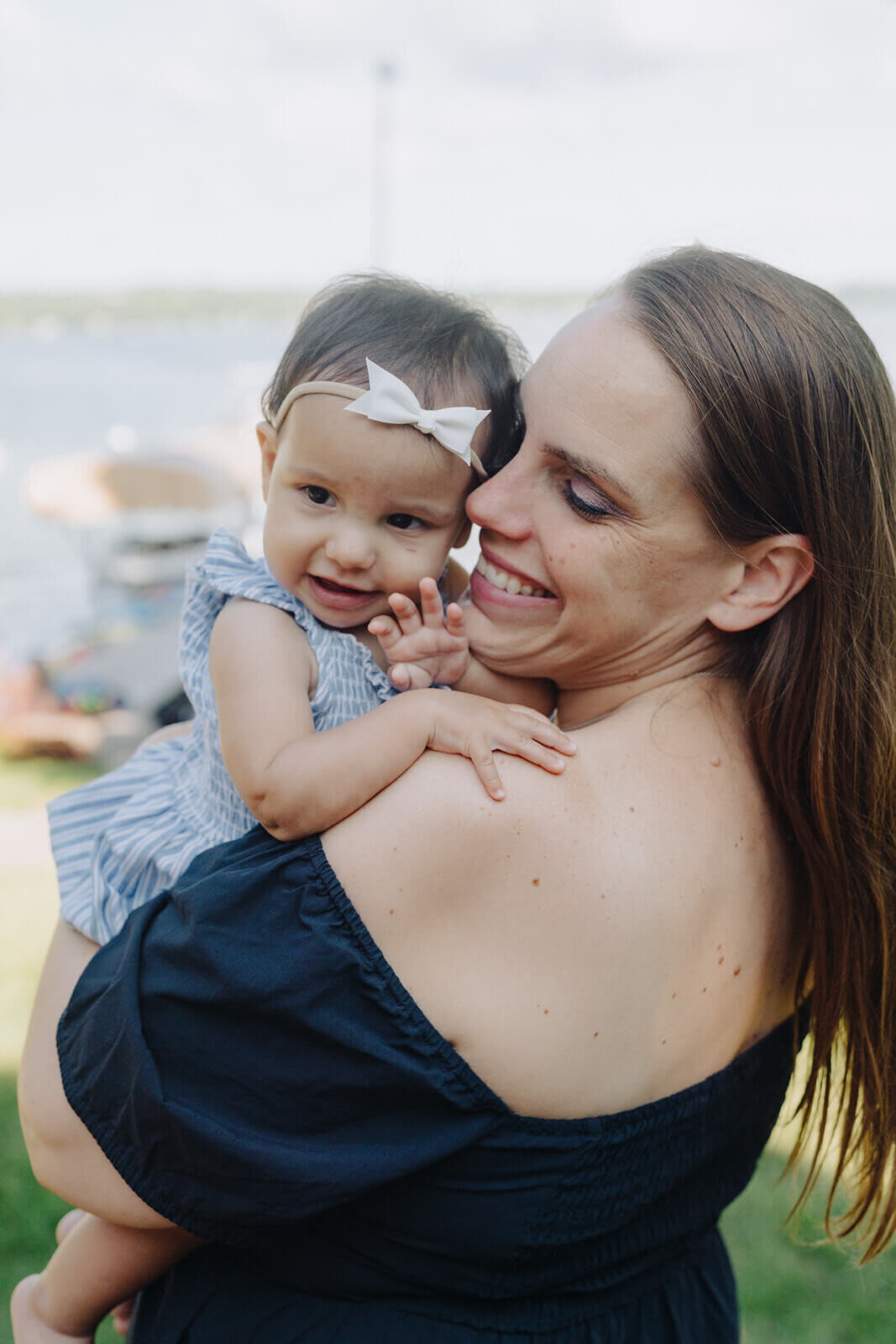 Mother holding baby at generational photoshoot in Finger Lakes, NY