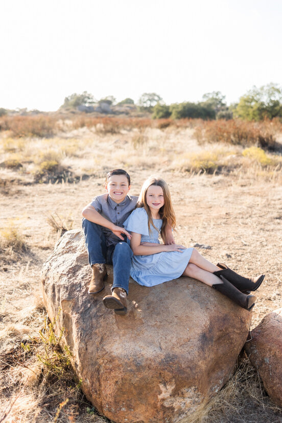 brother-sister-sitting-on-rock-wrights-field-san-diego