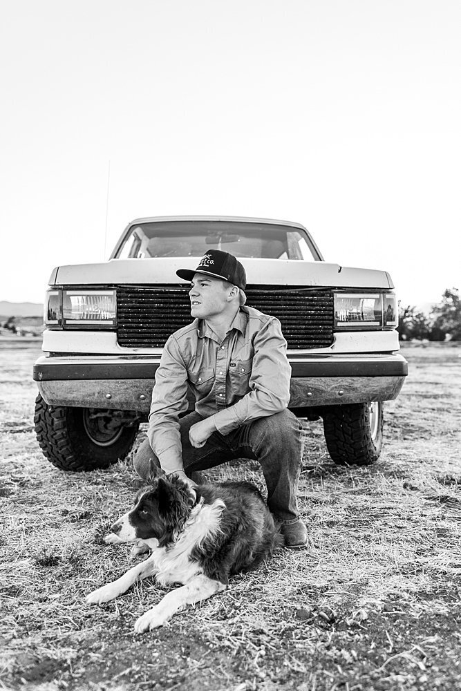 Senior guy with dog and truck