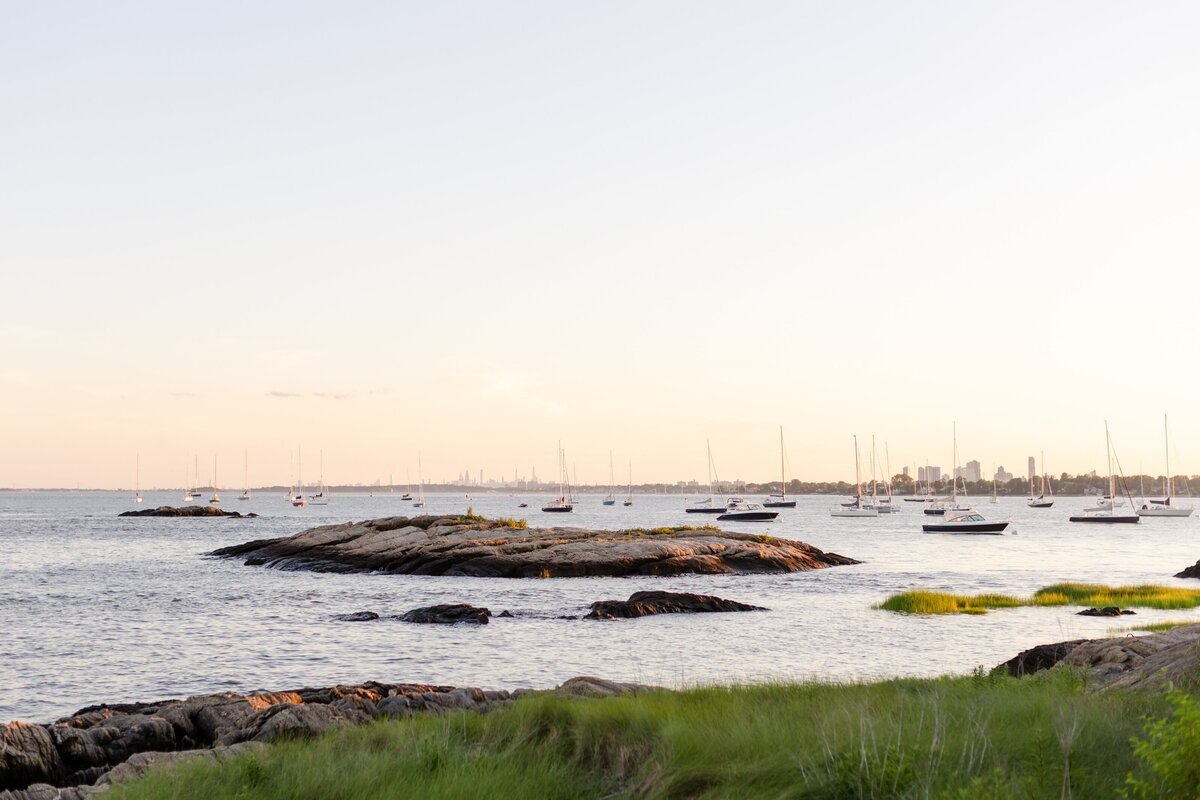 sunset over the water at American Yacht Club in Rye, NY