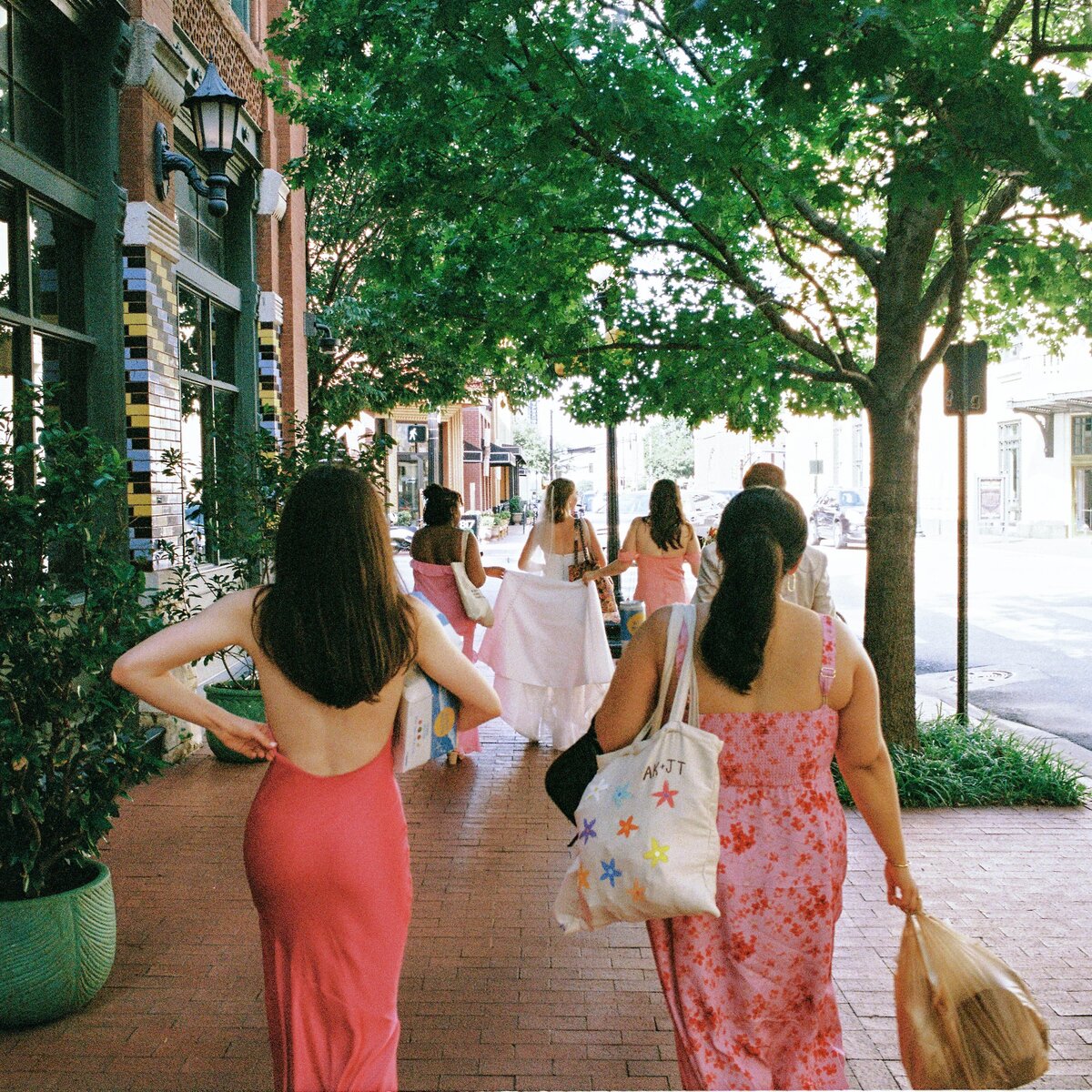 bride-and-bridesmaids-walking