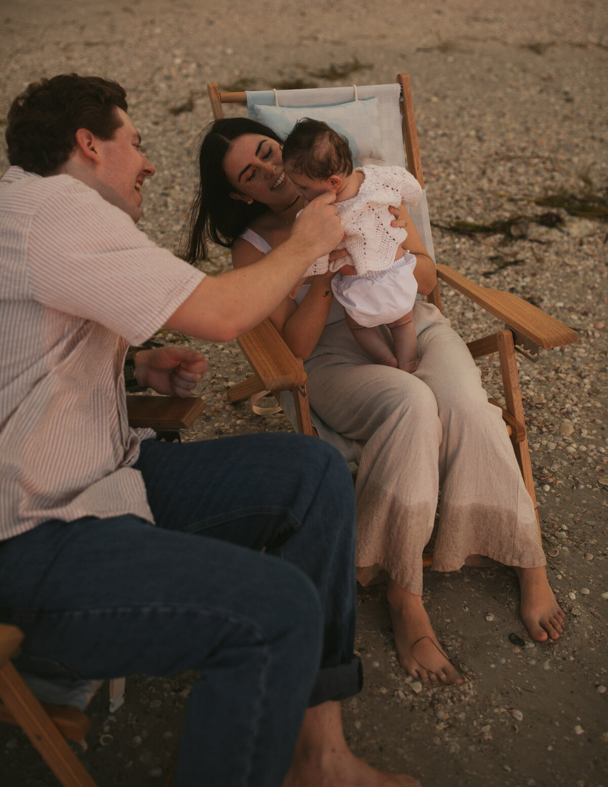 Playing with baby at the beach