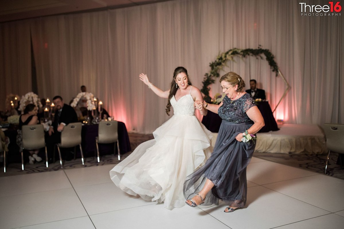 Bride struts her stuff with her mother