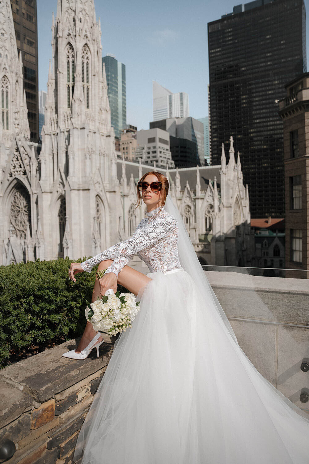 Bride standing on rooftop in New York City at 620 Loft and Garden for her wedding.