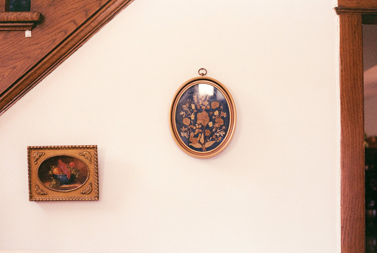 A couple gets ready at their home before their wedding at the Garfield Park Conservatory