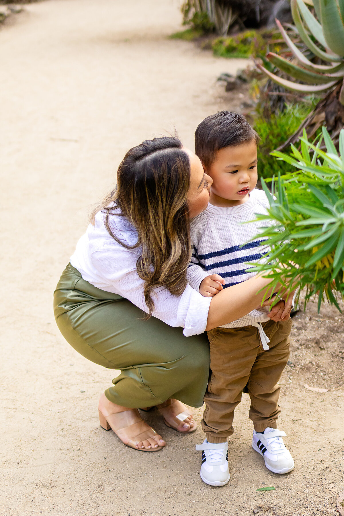 Mom and her toddler son during a playful family photo session  – Ellobelle Photography, lifestyle family photographer on the San Francisco Peninsula Stanford cactus garden Arizona Garden palo Alto