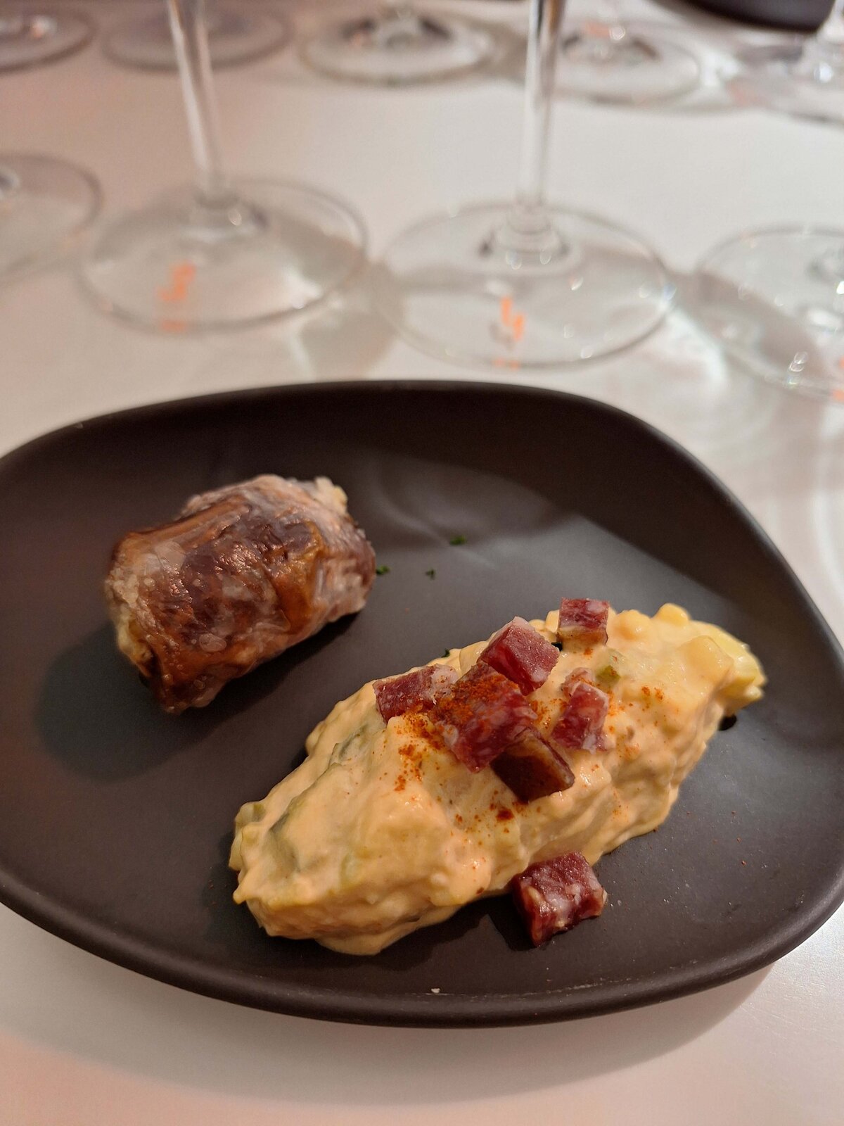 Two different tapas served during Wine Guide Madrid's Gourmet Wine Experience at Coalla.
