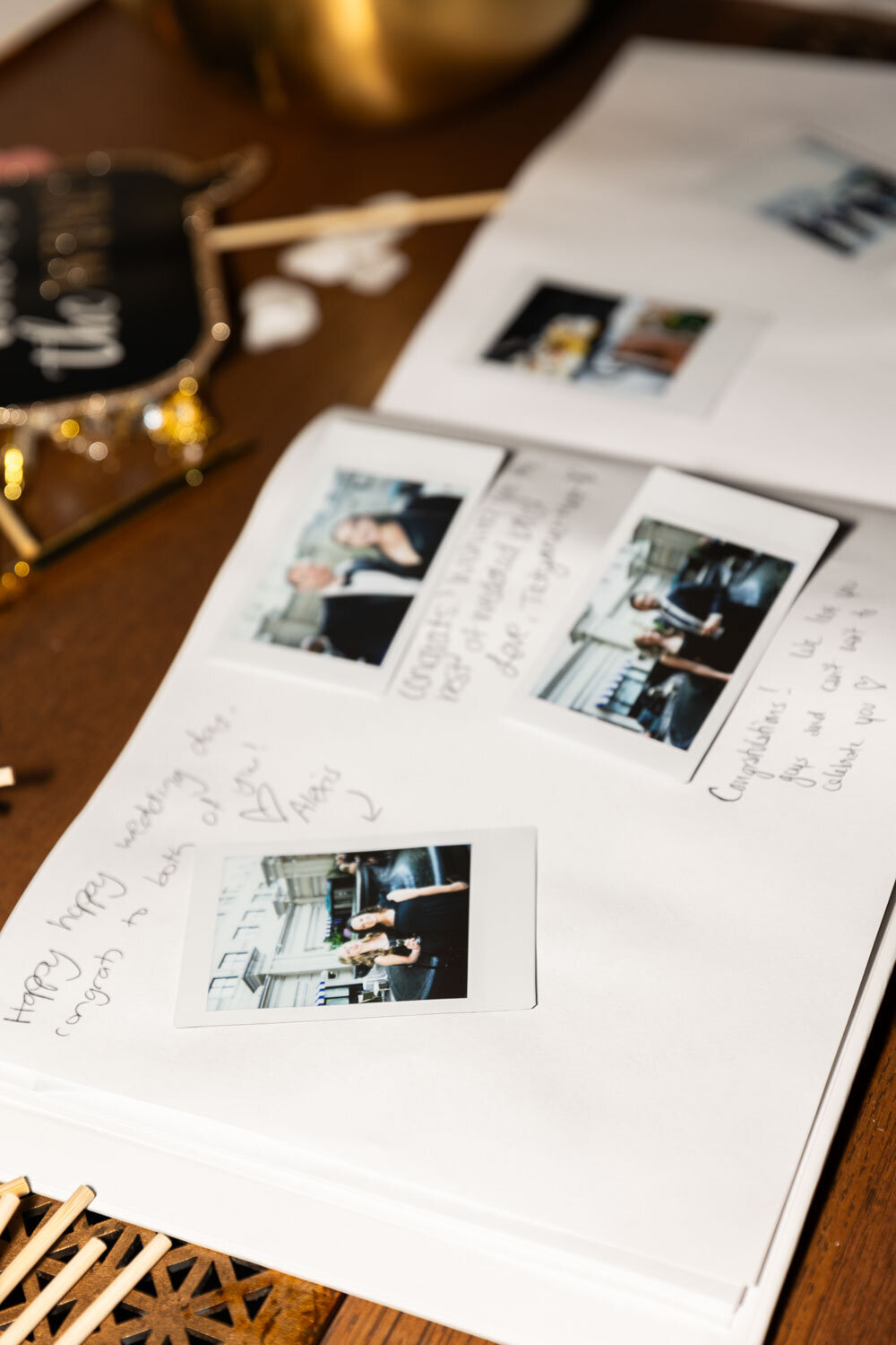 Guest book with Polaroid photos and handwritten messages