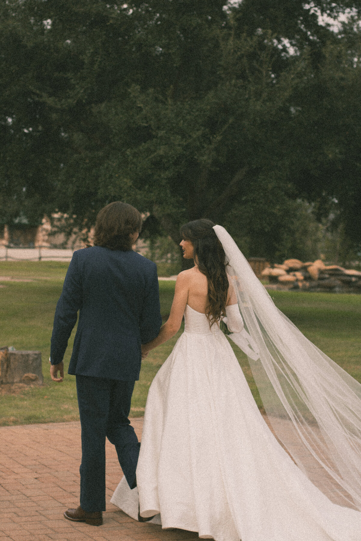 bride and groom candid ceremony exit photo film-like edit