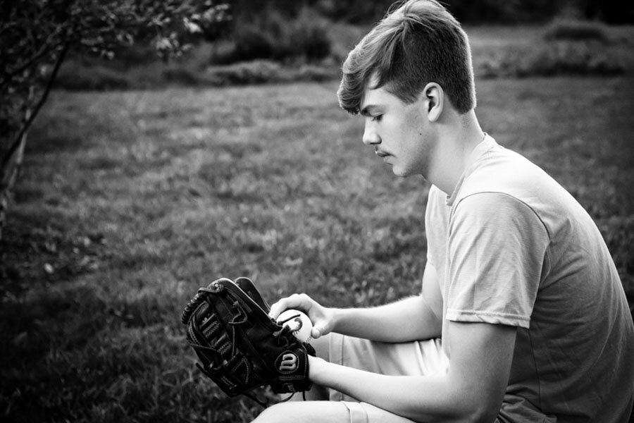 senior boy black and white with baseball glove