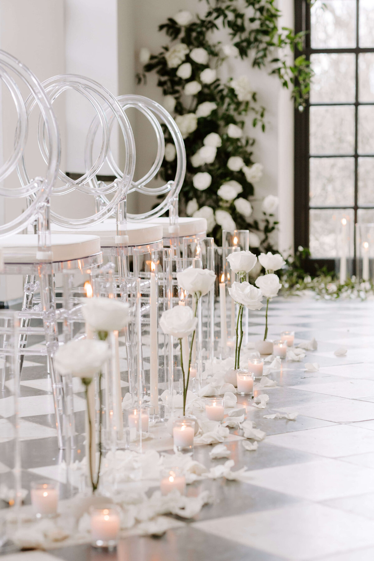 wedding ceremony with white florals and candles at conestoga house and gardens