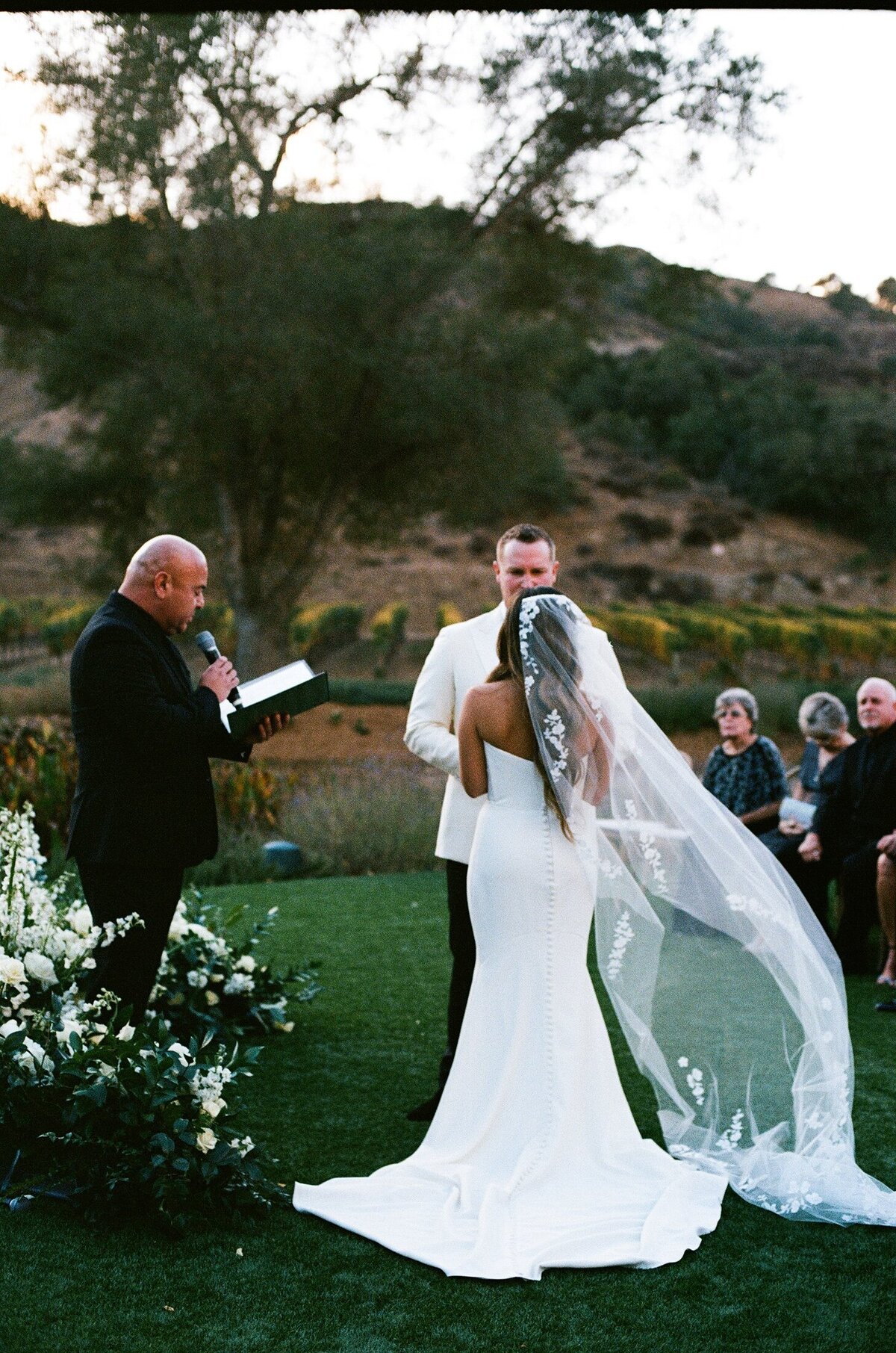 Bride and groom at altar 35mmfilm at winery