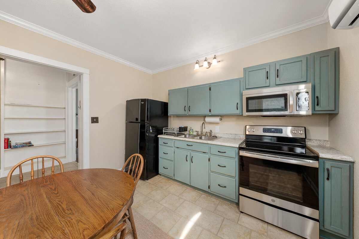 Beautiful kitchen area in the mother-in-law suite of this five-bedroom, 4-bathroom pet-friendly vacation rental house for 12 guests with free wifi, free parking, hot tub, mother-in-law suite, King beds and updated kitchen in downtown Waco, TX.