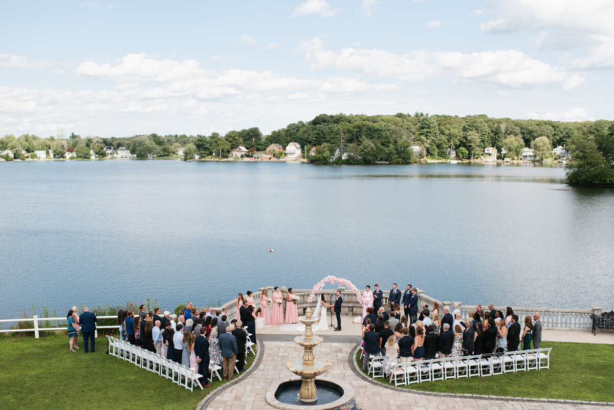 Say 'I do' at Grand View in Mendon, MA. A stunning lakeside wedding venue with breathtaking views, elegant spaces, and timeless photography opportunities