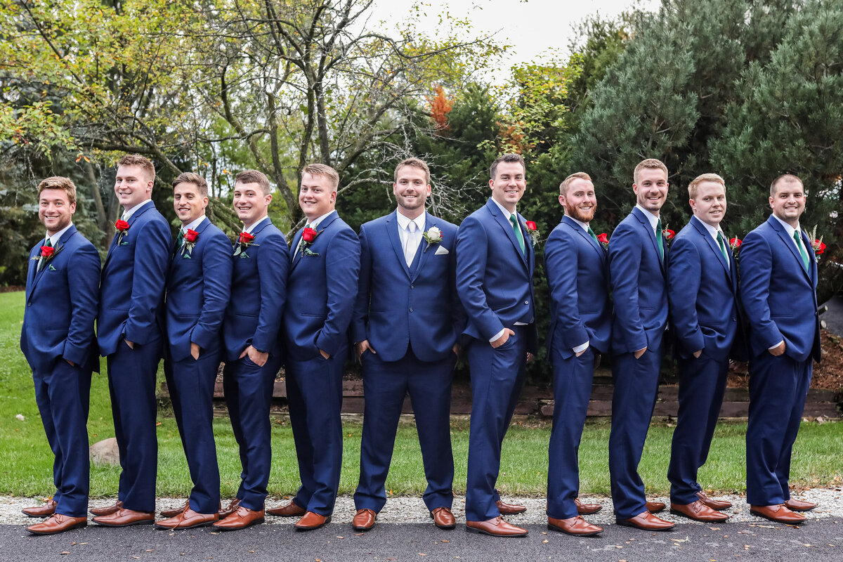 njeri-bishota-lauren-ashley-groomsmen-lineup-blue-suits-red-roses-marriage