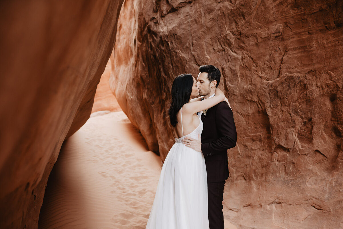 Utah elopement photographer captures bride hugging groom