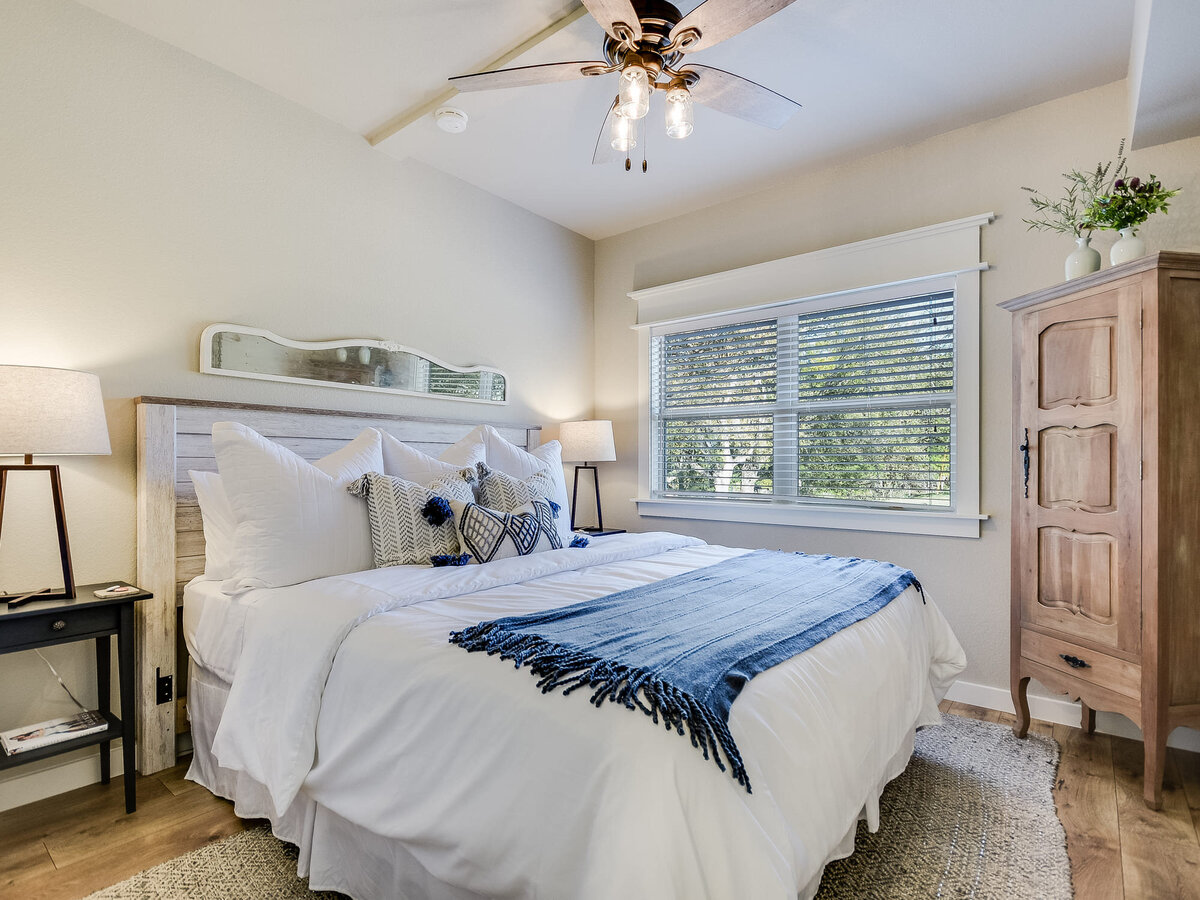 Barn double bedroom with wooden wardrobne