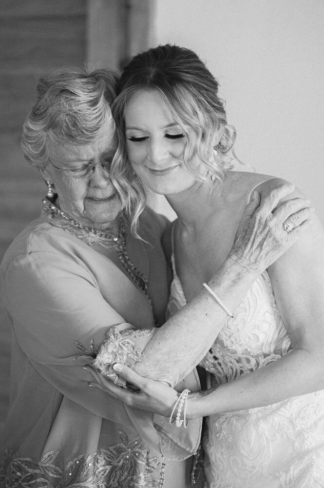 grandmother tearfully embraces bride in Fremont