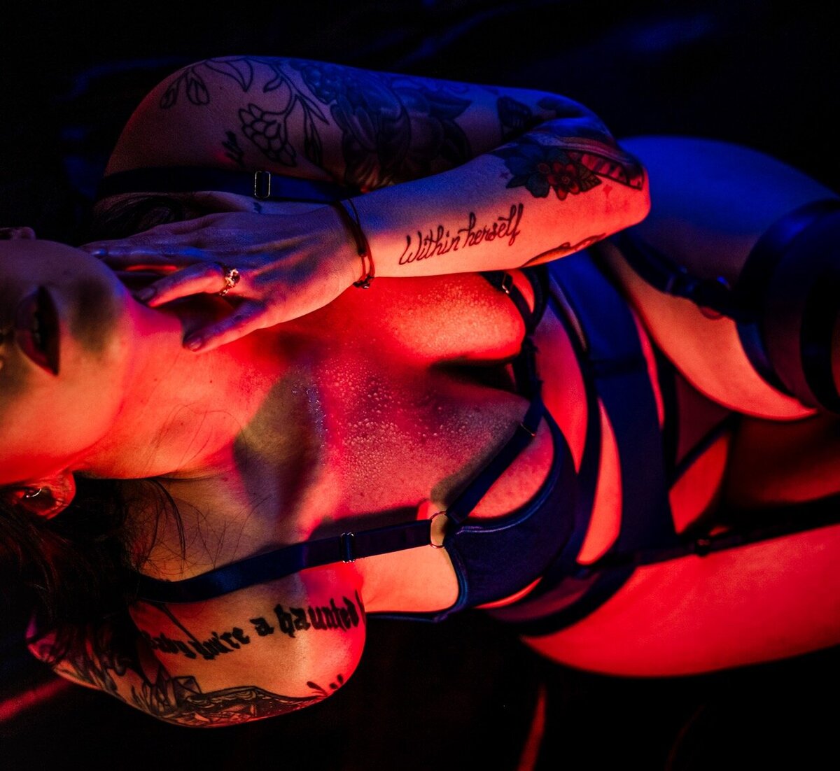 Boudoir photography woman in black lingerie in neon lights Lubbock, Texas Boudoir photographer in Amarillo TX