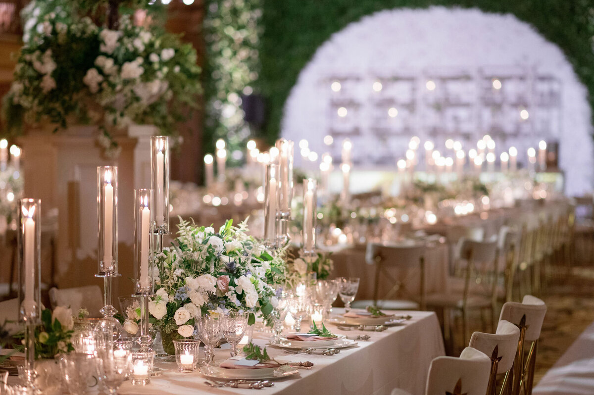 Close up of the highly decorated tables at the wedding reception. 