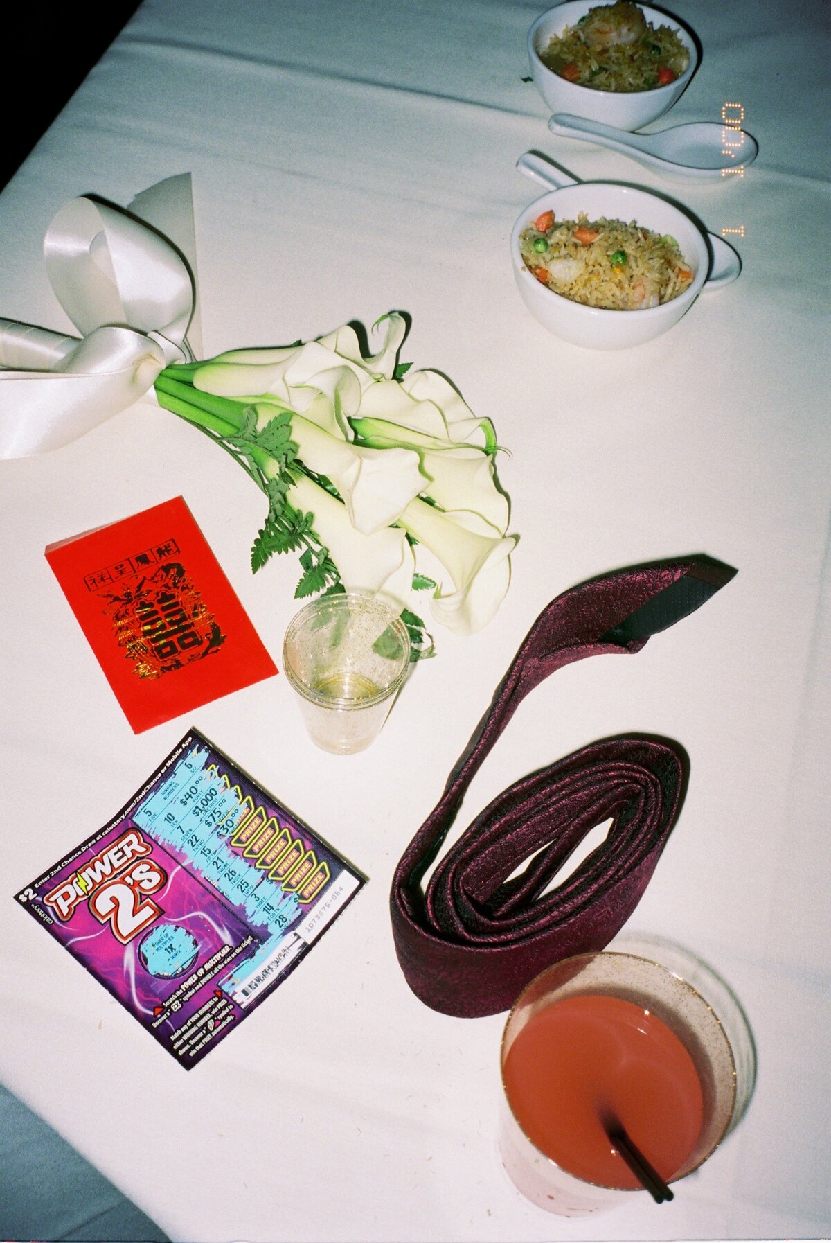 fun 35mm film photograph of wedding decor, drink, tie
