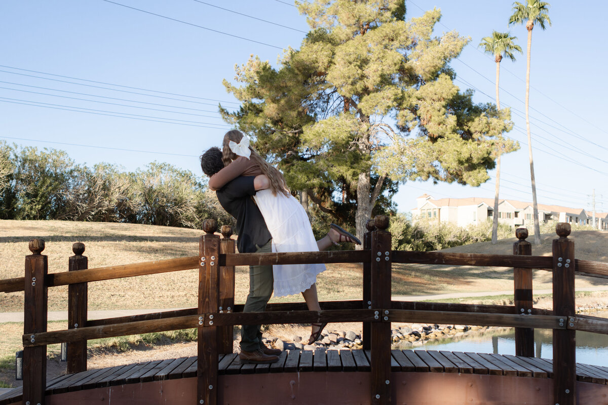 Jovanna G Photography. Classic, sophisticated Wedding Photos. Soft romantic engagement photos. Soft romantic WeddingPhotos. Sophisticated Wedding Photographer. Professional Wedding Photographer. Destination Wedding Photographer. Luxury Wedding photographer. Traveling Wedding Photographer. AZ Wedding Photographer. Gilbert AZ Wedding Photographer. Queen Creek Wedding Photographer. Phoenix Wedding Photographer. Scottsdale Wedding Photographer. Flagstaff Wedding Photographer. SoCal Wedding Photographer. California Wedding Photographer. Northern California Wedding Photographer. Southern California Wedding Photographer. San Francisco Wedding Photographer. Bay Area Wedding Photographer. San Jose Wedding Photographer. Golden Gate Bridge Wedding Photographer. Beach Lover Wedding Photographer. Palace of the Fine Arts Wedding Photographer. Ocean Lover. I love California. Orange County Wedding Photographer. Newport Beach Couples Photographer. Newport Beach Wedding Photographer. Laguna Beach Couples Beach Engagement Photographer. Laguna Beach wedding beach photographer. Los Angeles Wedding Photographer. Young and in love engaged couples who live in southern California. Christian Young Couple. Young Engaged Couple. Engaged High School Christian Couple. Christian Values. Young conservative Christian women. Young Conservative Christian men. Young Conservative Christian Couple. Young Christian Couple Engaged in High School. Young Christian College Couple. Lakeside Lovers in the Autumn Sun. David & Grace - engagement photos. Jovanna G Photographer Engagement Photos. Arizona sun shining through autumn trees- engagement. Chandler, AZ Engagement Photos. Chandler, AZ 2026 bride. Chandler, AZ Wedding Photographer. Chandler, AZ Young Engaged Couple. Girl in her 20s. Engaged Arizona Girl in her 20s. Lakeside Engagement photos. AZ Lakeside Engagement Photos. AZ Weeping Willow Lakeside Proposal. Arizona Lakeside Proposal with weeping willow tree. Detail shot of engagement ring on Arizona Lakeside estate. Chandler, AZ Lakeside Estate Proposal Outfit Inspiration.