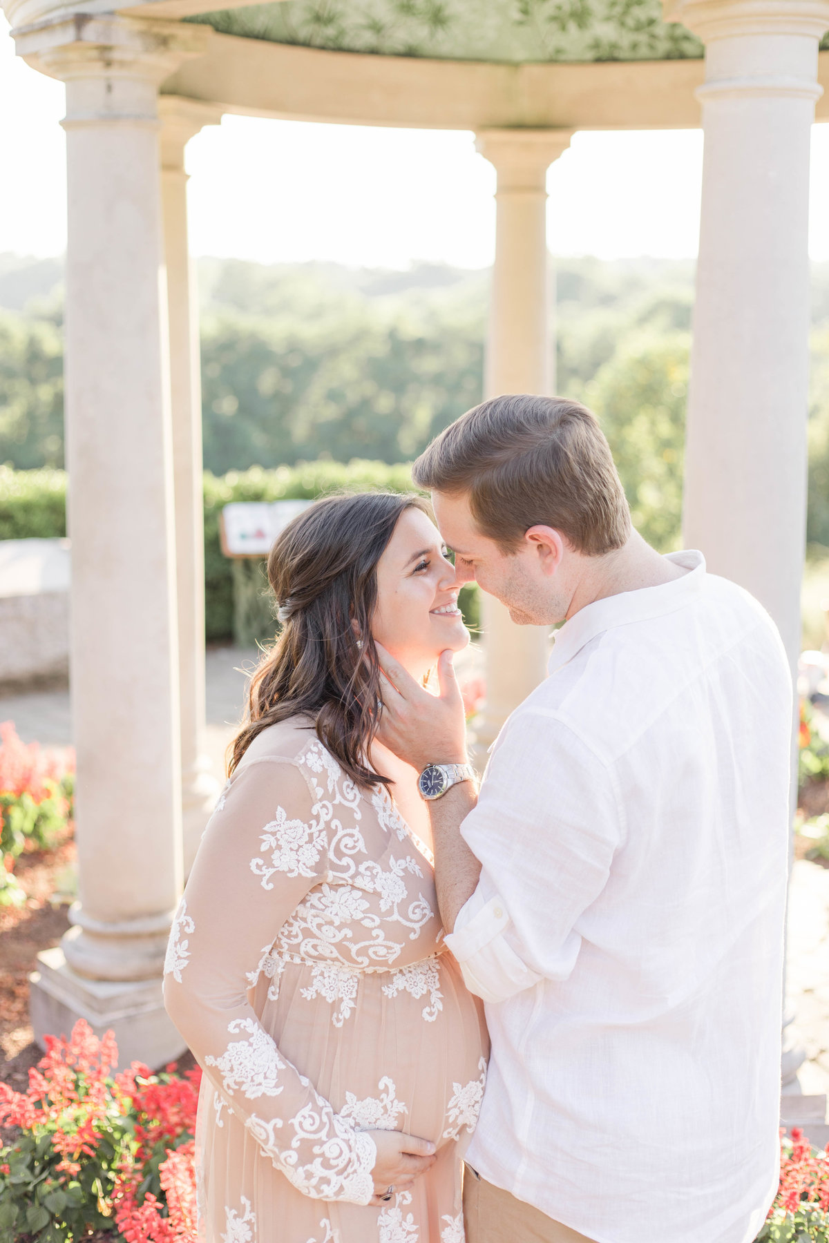 Glenwood Gardens light and airy sunset maternity session mom and dad at golden hour