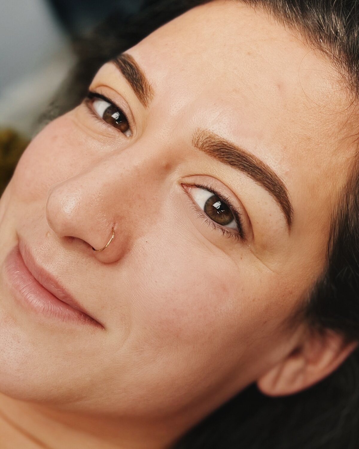 Close-up of healed powder brows after permanent makeup session at Artistry by Jessica.