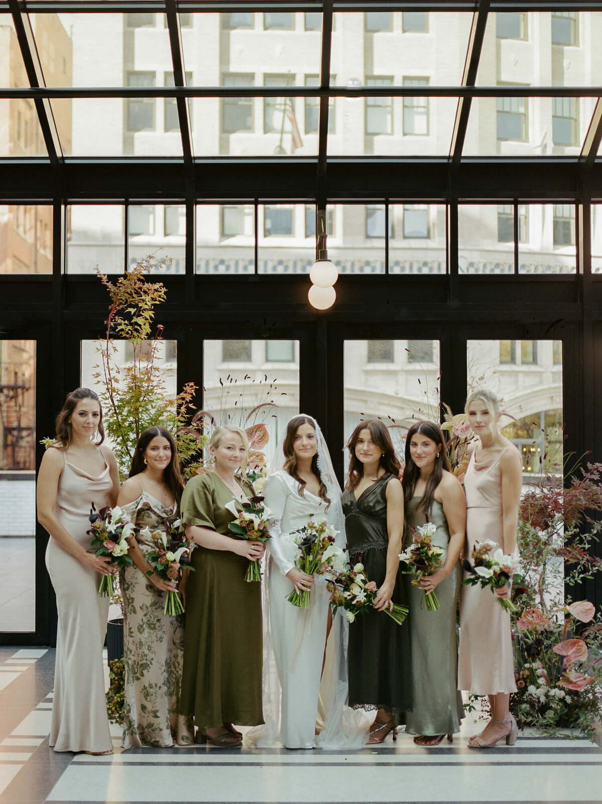 Different bridesmaids dresses, fall bridesmaids, fall wedding colors, Shinola Hotel in Detroit, Michigan