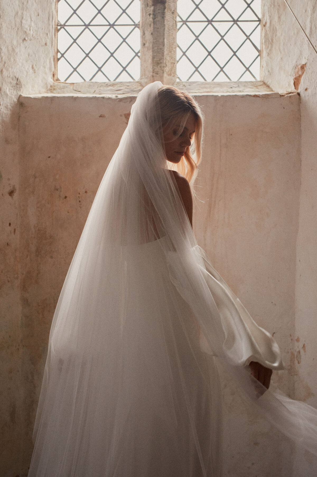 Benjamin Wheeler photography of bride wearing handmade long silk corset wedding dress