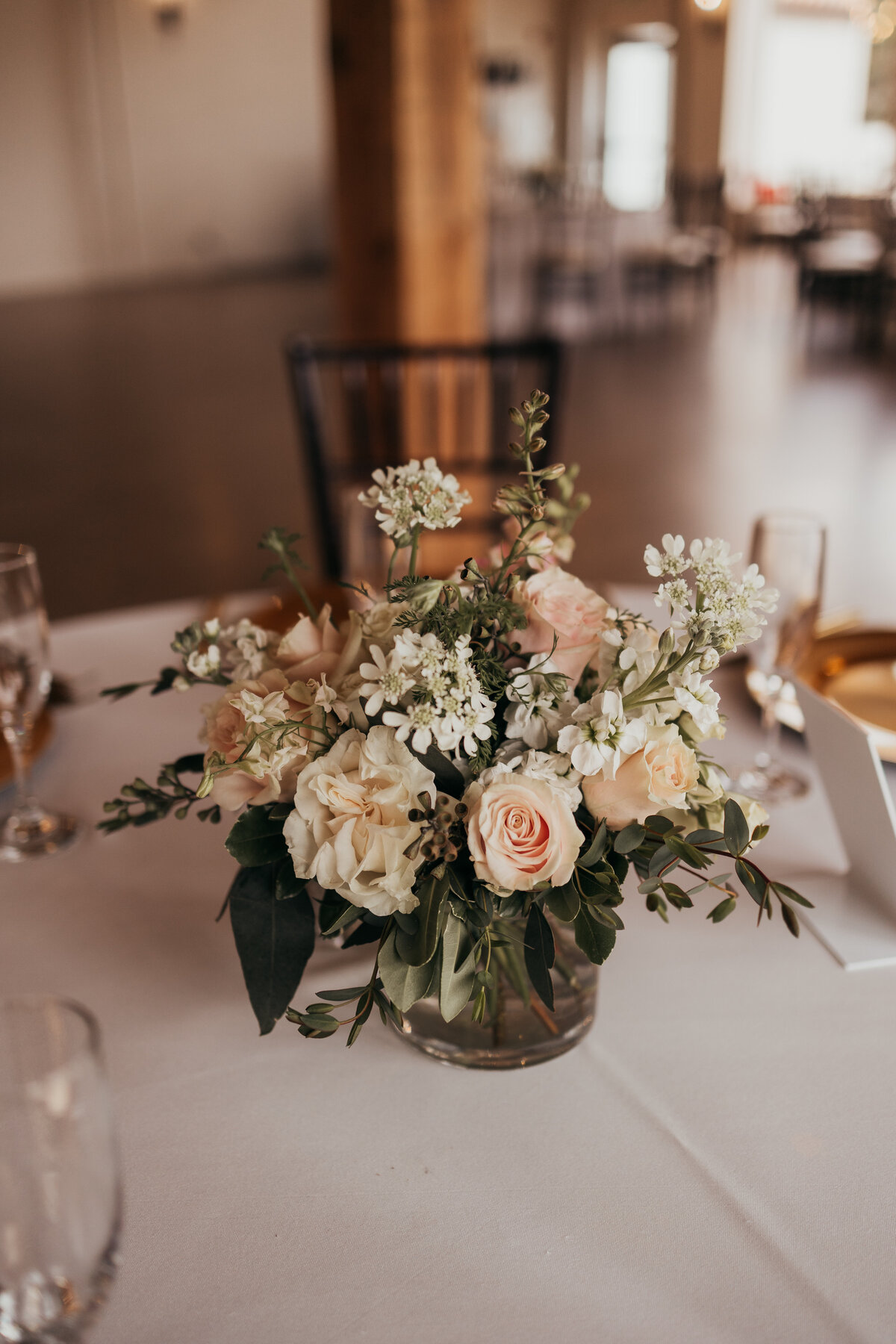 Loving this wedding center piece with the pale pinks, olive greens with a hint of whites makes for such a beautiful wedding reception center piece.