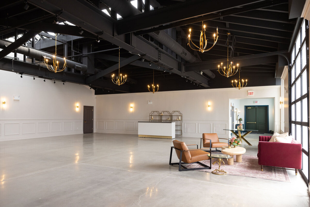 Happy Hour main space showing large blank slate with in-house elements, daytime natural light