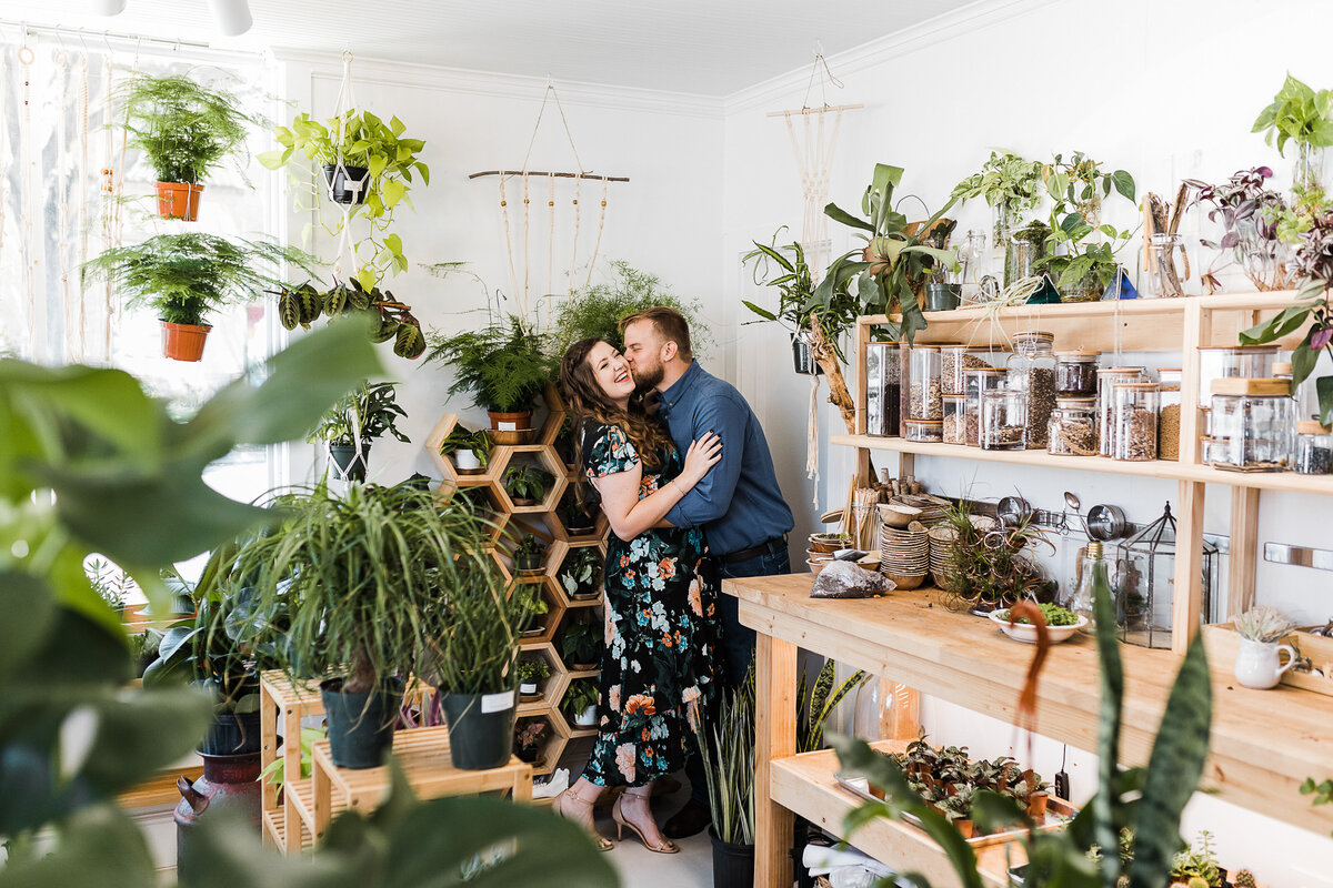 Modern engagement photos with plants