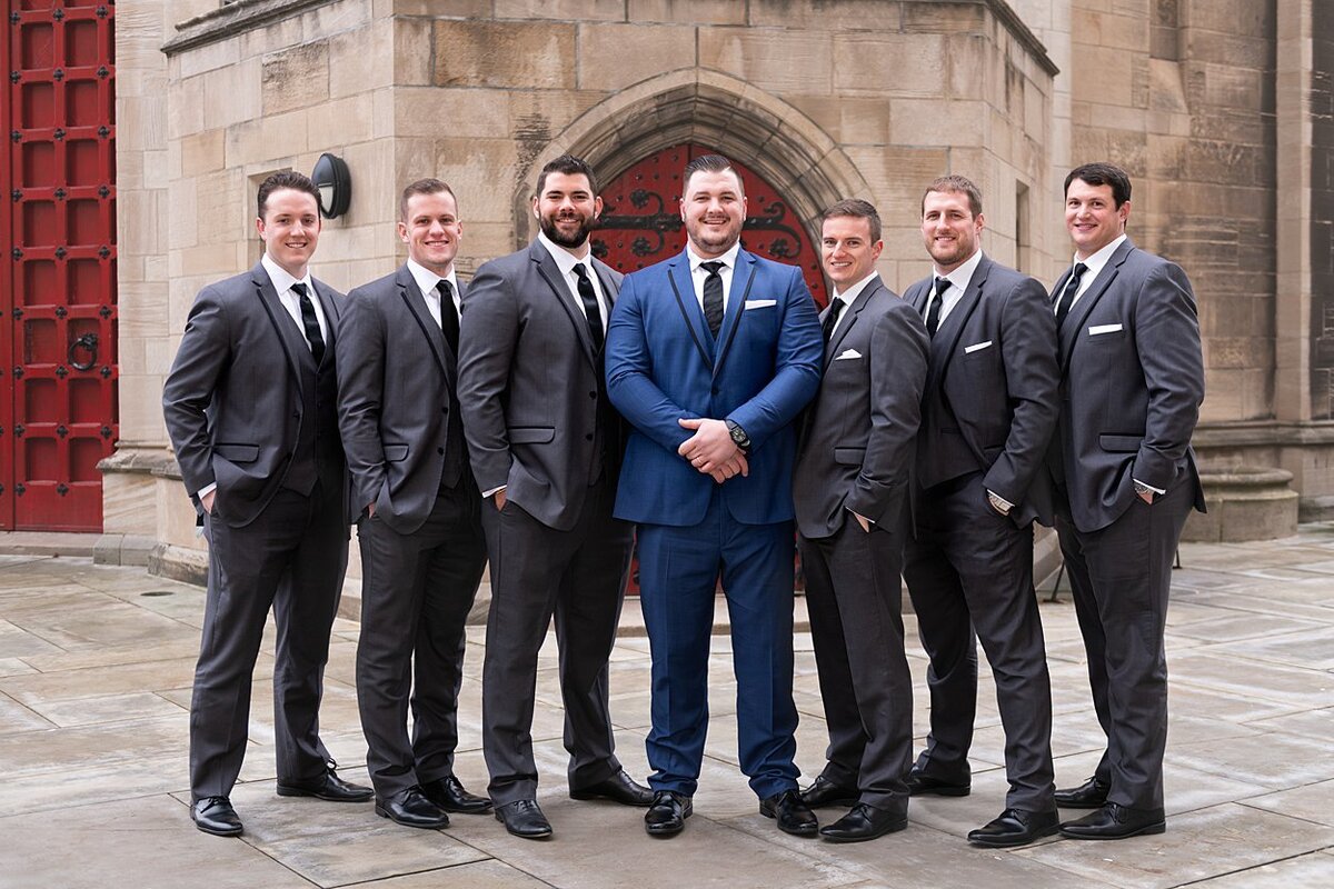 NFL free agent Groom with his Groomsmen in the plaza at the Cathedral of Learning in Pittsburgh, PA