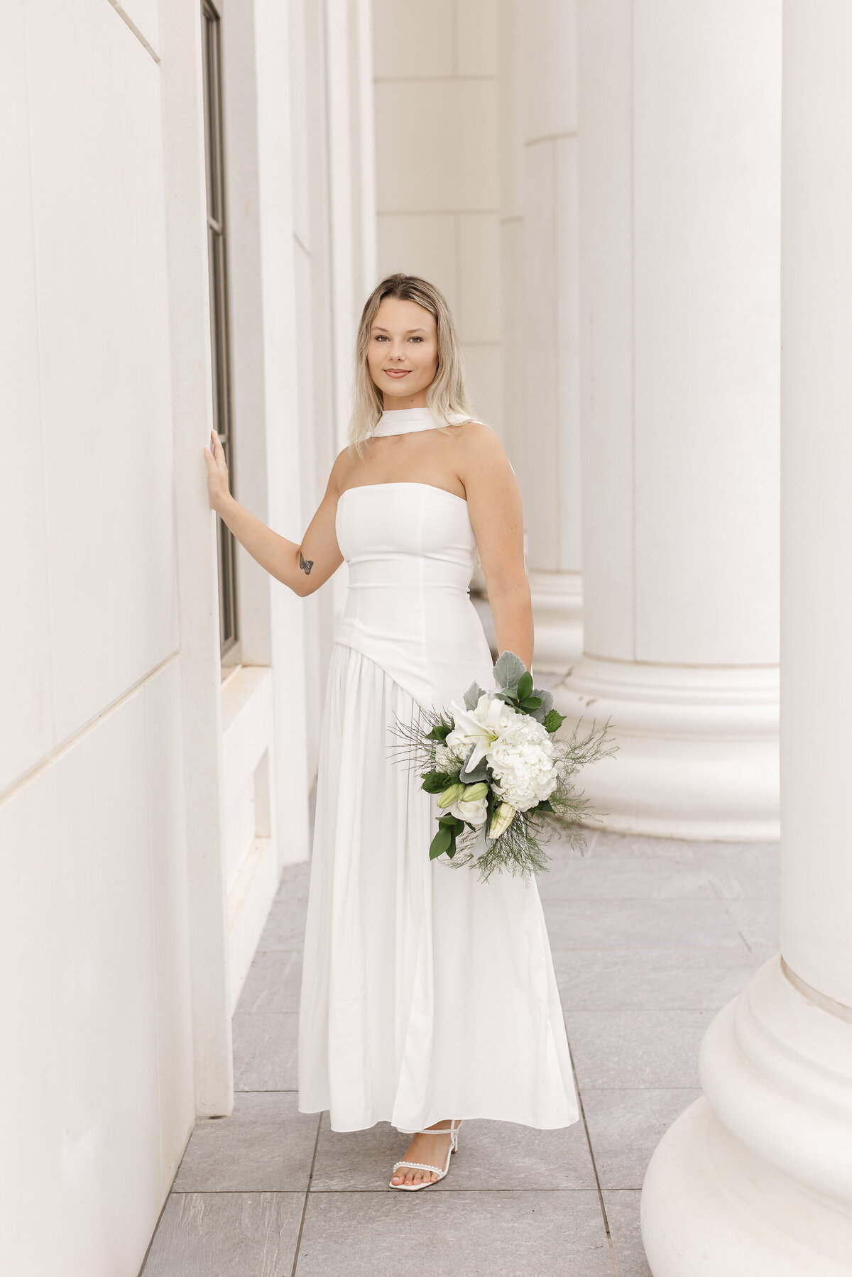 spartanburg-courthouse-wedding-bride-portrait-white-columns.jpg