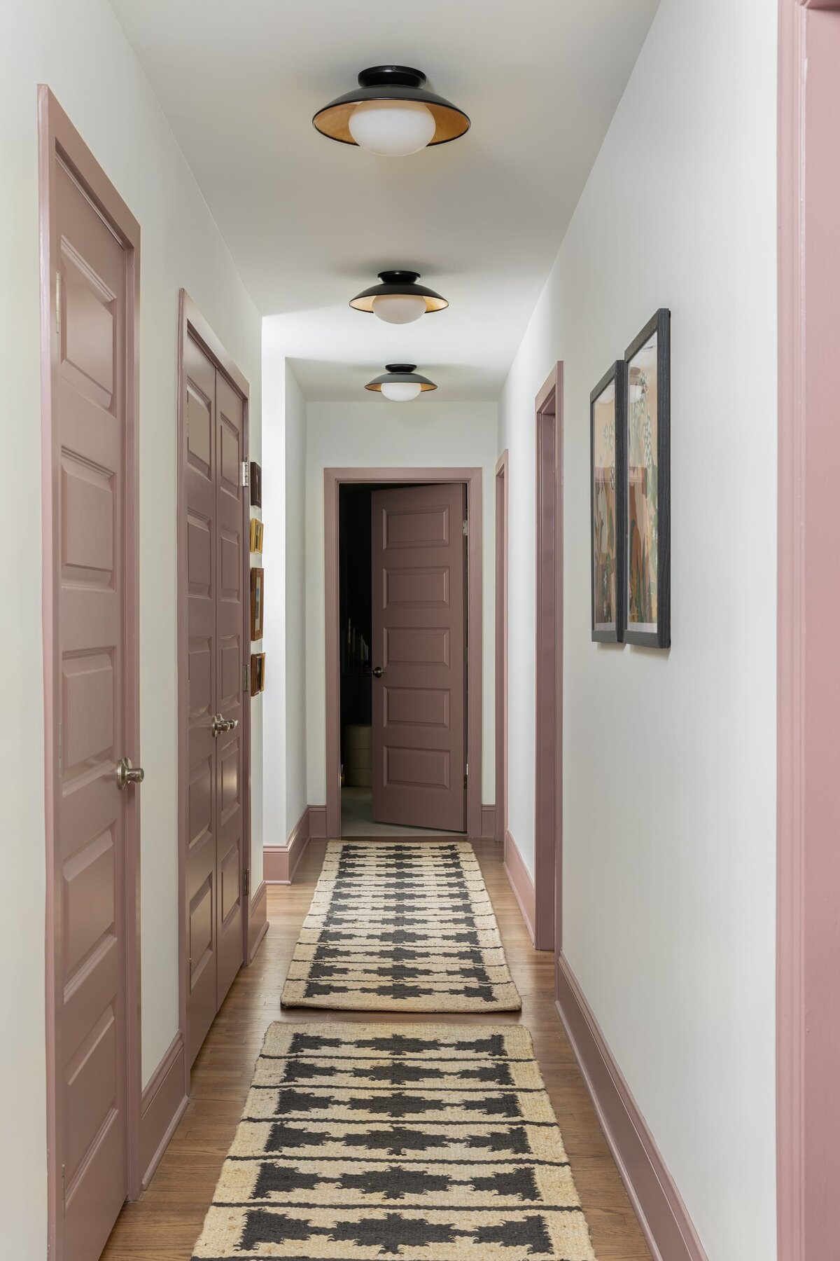 melinda chesson interiors murrayhill road colorful hallway pink doors statement runner rug