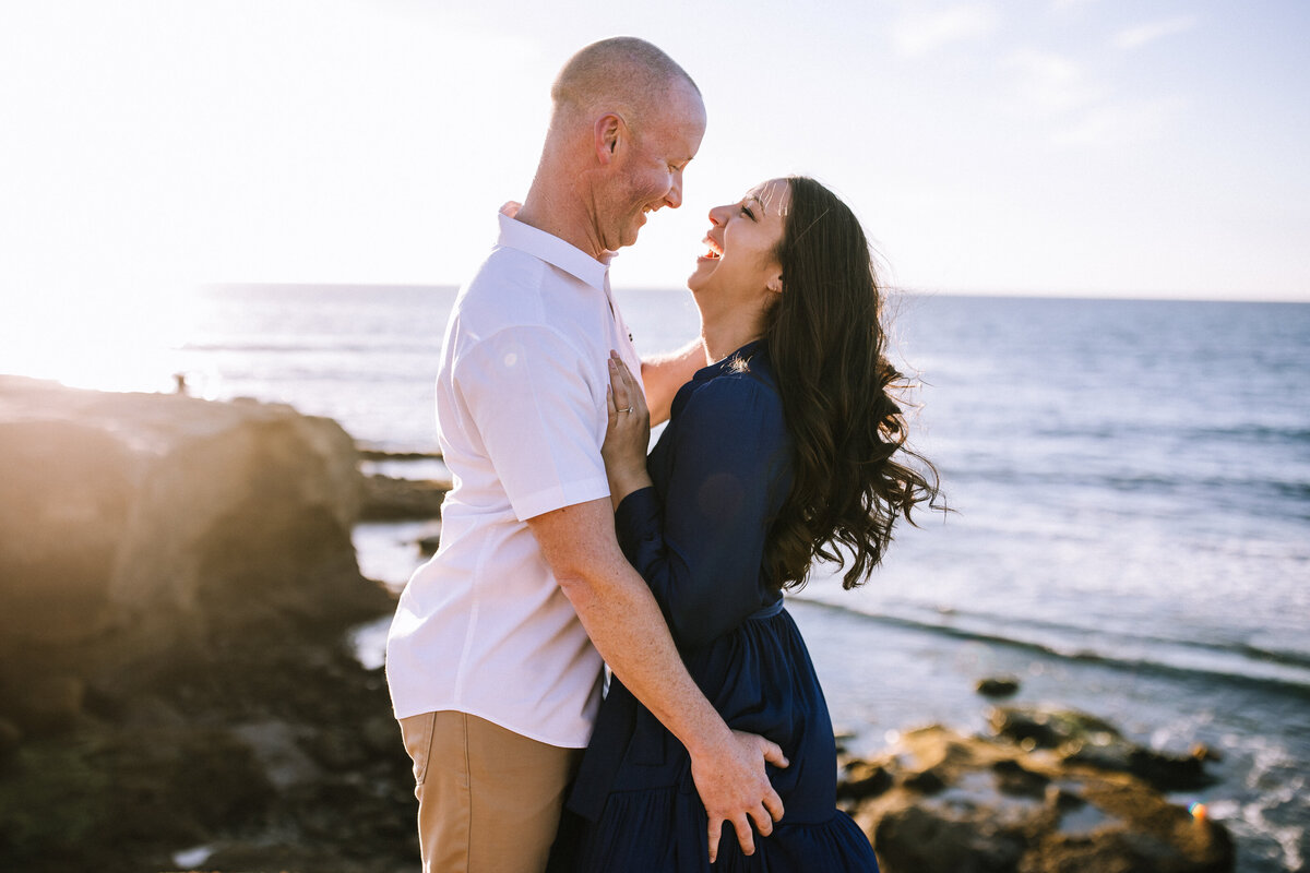 Engaged couple on the sunset cliffs of San Diego, California.