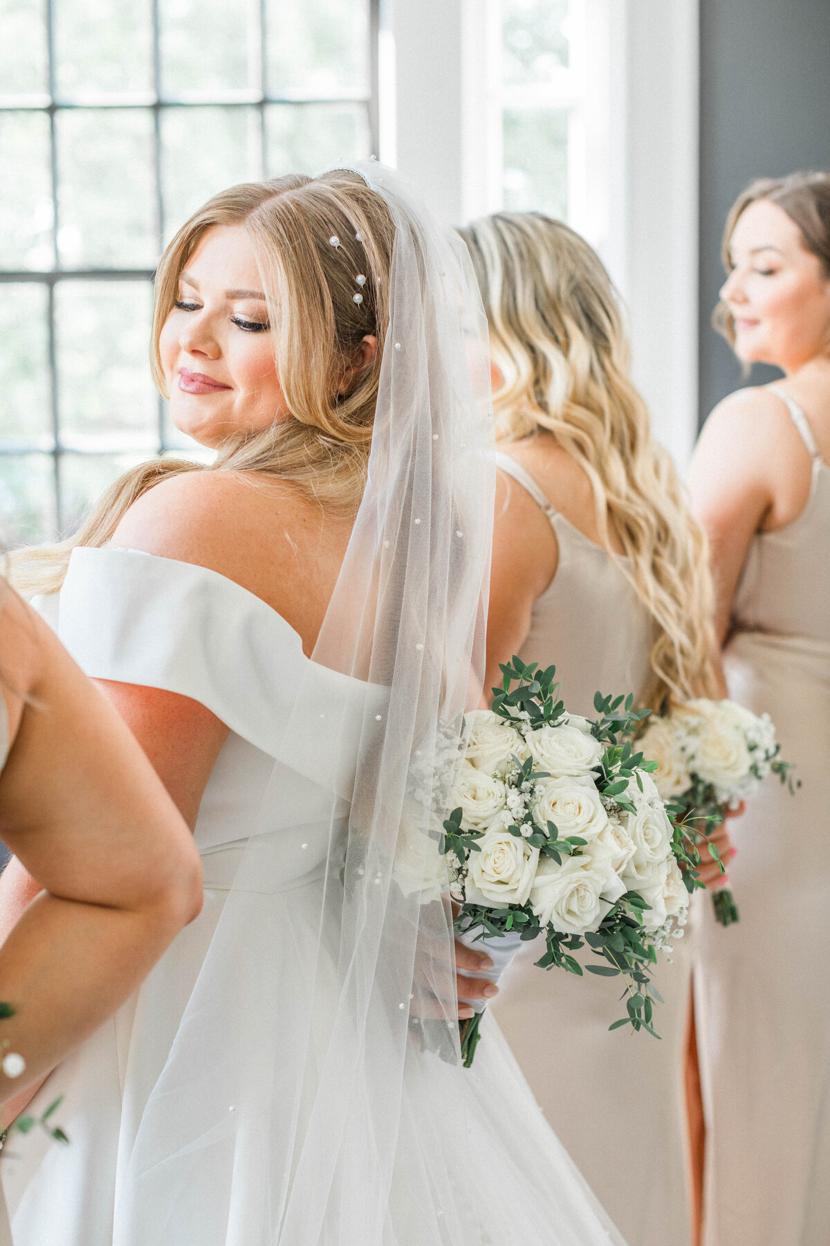 bridal party photos taken at a black tie wedding