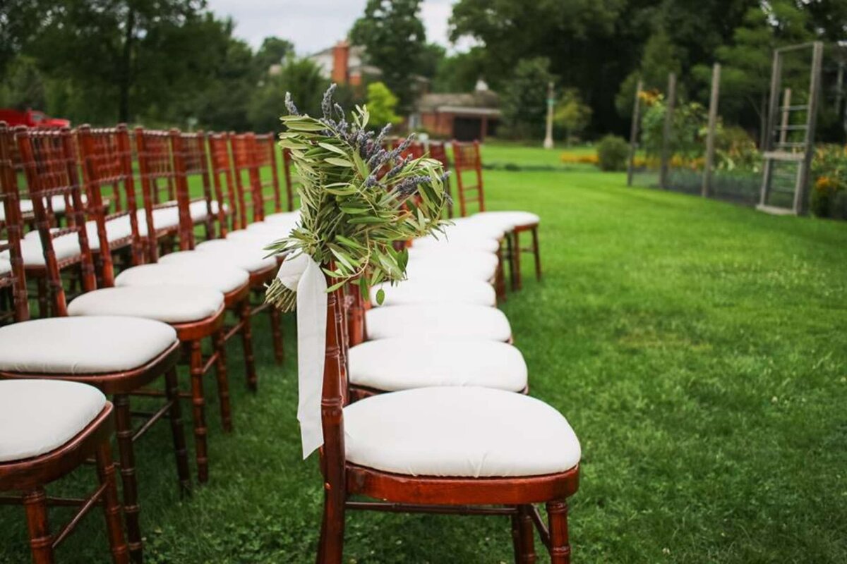 Garden style aisle markers for an outdoor ceremony at a luxury Italian inspired Chicago North Shore wedding.