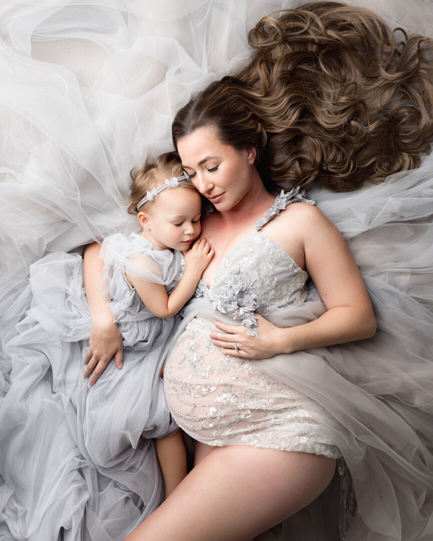 Lansing Maternity Photography Mom Laying with Daugher by For the Love of Photography