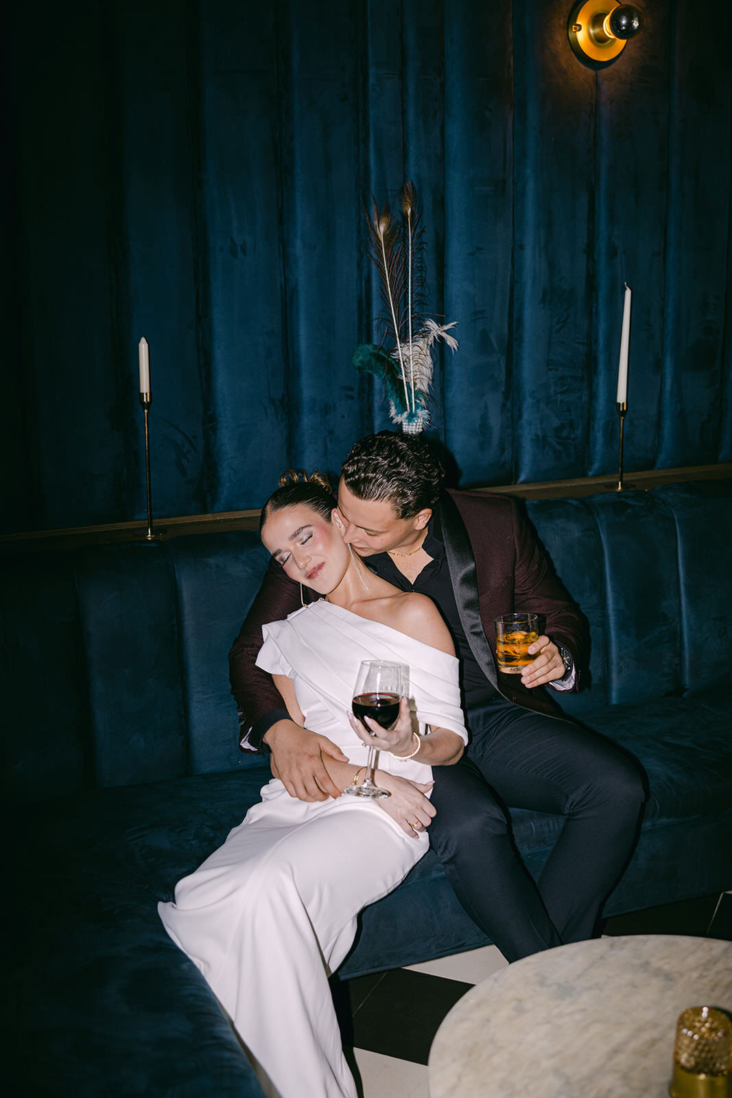 couple-in-lounge-holding-drinks-4CD-ES