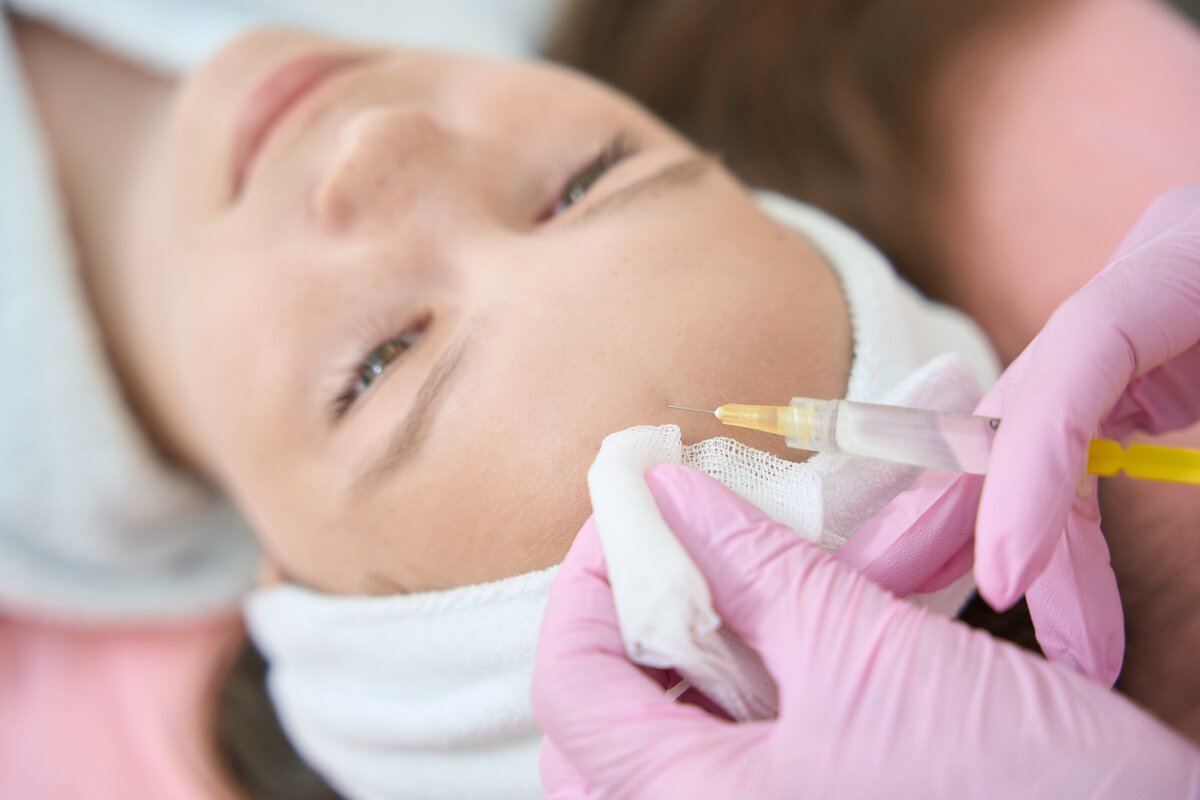 beautician-makes-injection-for-acne-treatment-to-g-2023-11-27-05-26-12-utc