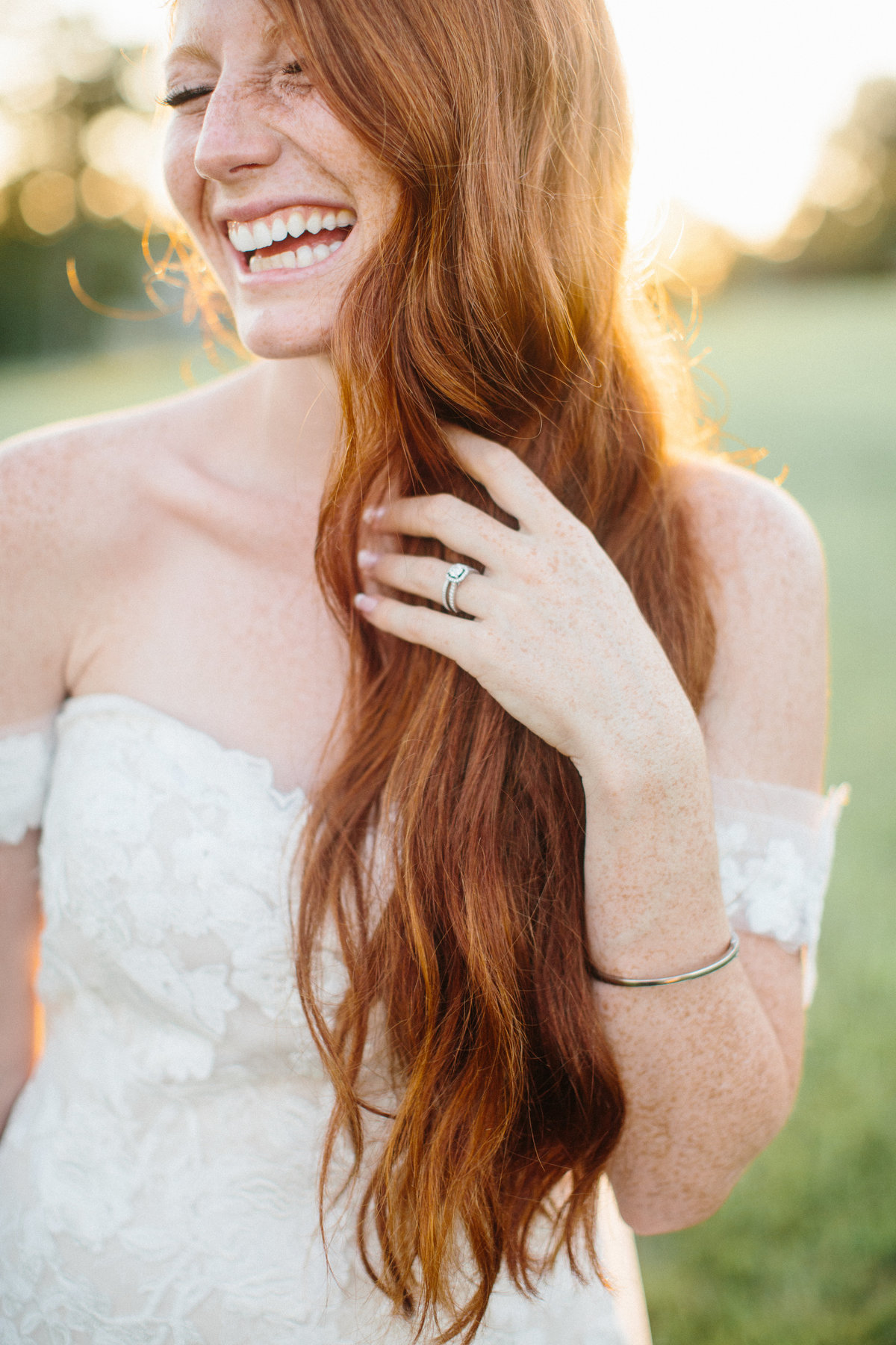 bride laughing during close up bridal portraits