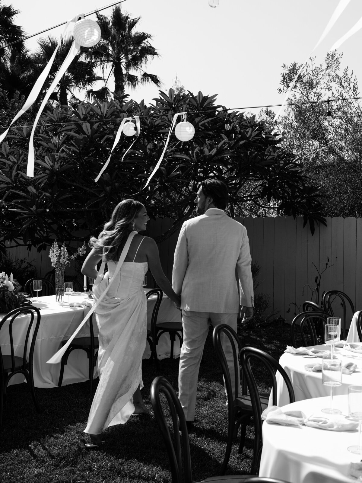 Bride and groom at backyard wedding reception in San Diego