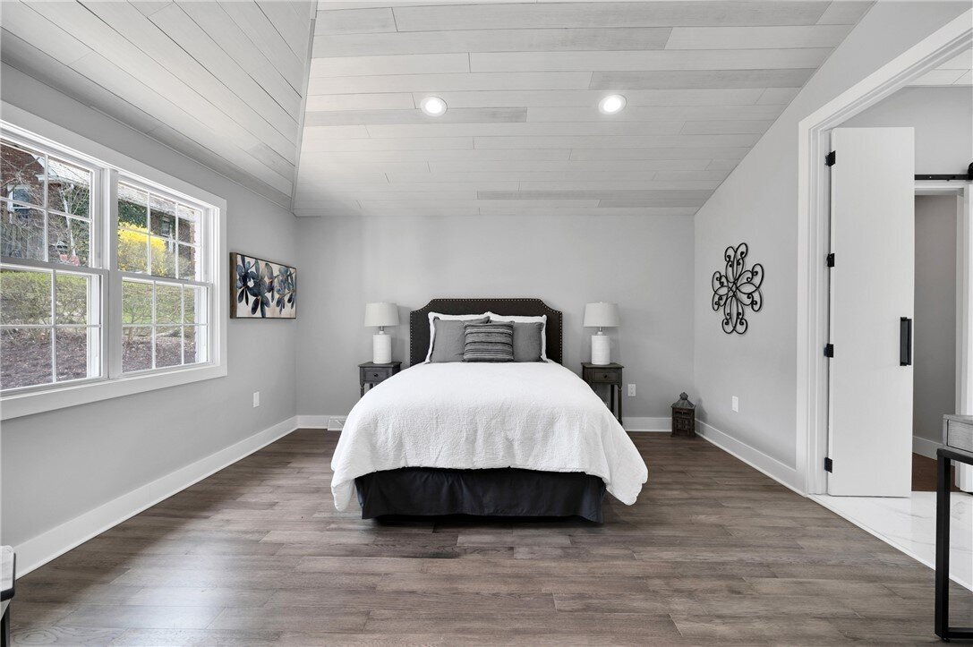 Bright and inviting staged bedroom showcasing functional design for quick home sale