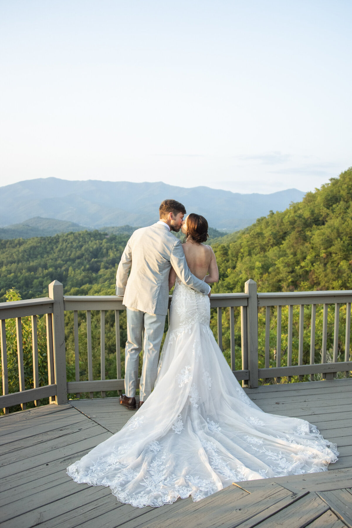 Couple kissing during mountain top wedding at Hawkesdene