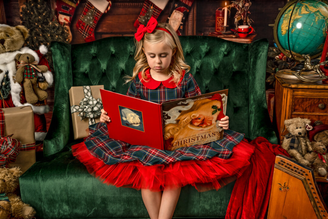 The Santa Experience Sitting on Couch Reading a Book by For The Love Of Photography.jpg