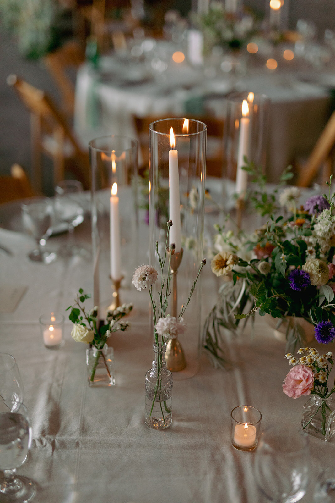 wildflower-wedding-reception-table-taper-candles-diamond-cross-ranch-wy