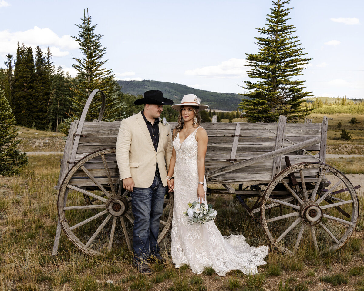 bride and groom holding hands